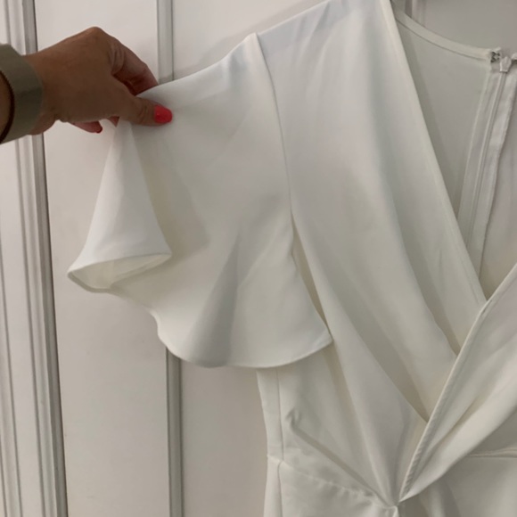 Ivory flutter sleeve ruffle dress. - Picture 4 of 5